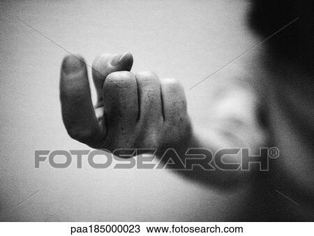 Stock Image - Hand, close-up, b&w. Fotosearch