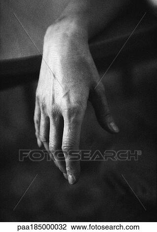 Stock Image - Hand, close-up, b&w. Fotosearch