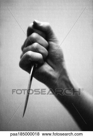 Hand holding knife, close-up, b&w View Large Photo Image Stock Photo - Hand holding knife, close-up, b&w. Fotosearch