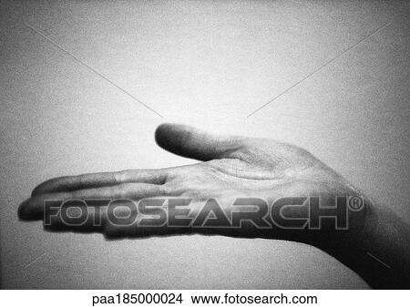 Hand with palm up, close-up, b&w View Large Photo Image Picture - Hand with palm up, close-up, b&w. Fotosearch