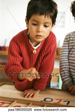 Child pointing, blurred View Large Photo Image Stock Photograph - Child pointing, blurred. Fotosearch