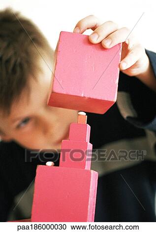 Stock Image - Child with blocks. Fotosearch