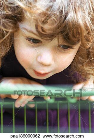 Child's face, looking down View Large Photo Image Stock Image - Child's face, looking down. Fotosearch