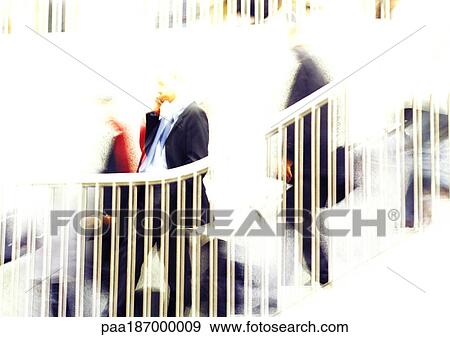 Businessman on stairs, blurred View Large Photo Image Stock Photo - Businessman on stairs, blurred . Fotosearch