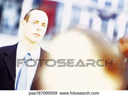 Stock Photo - Businessman, portrait, blurred. Fotosearch