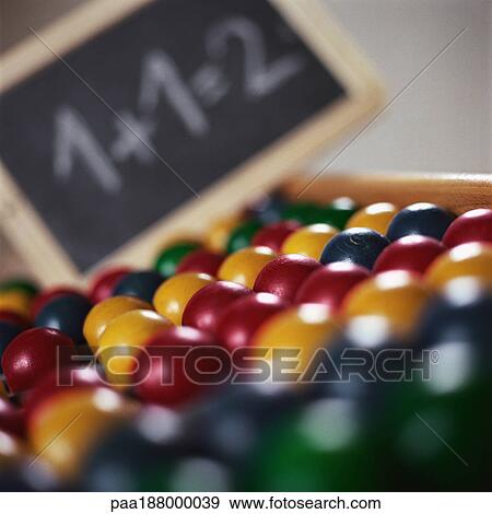 Abacus lying flat with chalk board in background. View Large Photo Image Stock Photo - Abacus lying flat with chalk board in background. . Fotosearch