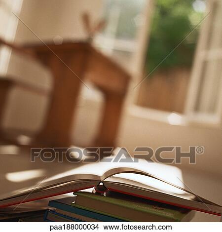 Books on floor in room. View Large Photo Image Picture - Books on floor in room.. Fotosearch