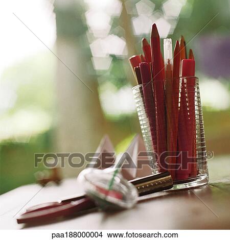 Cup of pencils and markers on table. View Large Photo Image Picture - Cup of pencils and markers on table.. Fotosearch
