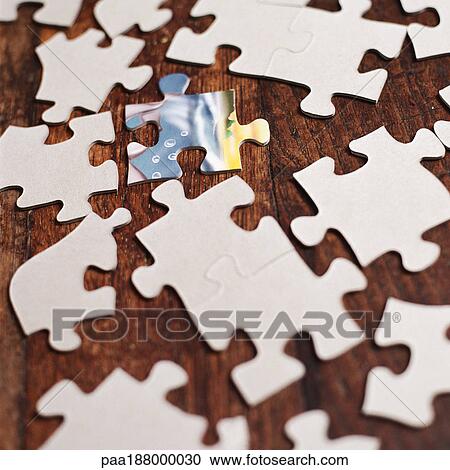 Puzzle pieces spread out on floor. View Large Photo Image Stock Image - Puzzle pieces spread out on floor.. Fotosearch