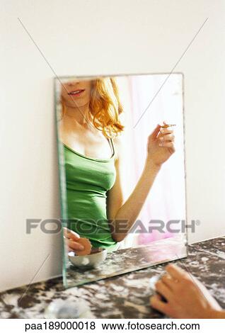 Woman's reflection in mirror. View Large Photo Image Stock Photo - Woman's reflection in mirror.. Fotosearch