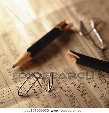 Broken pencil and twisted paper clips on top of financial numbers. View Large Photo Image Stock Image - Broken pencil and twisted paper clips on top of financial numbers.. Fotosearch