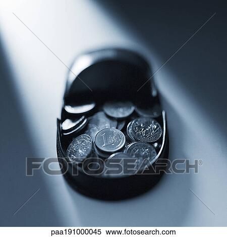 Stock Photography - Change inside coin holder.. Fotosearch