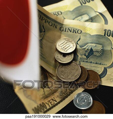 Stock Photo - Japanese paper money and coins.. Fotosearch
