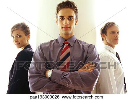 Business people standing together, waist up. View Large Photo Image Stock Photograph - Business people standing together, waist up.. Fotosearch