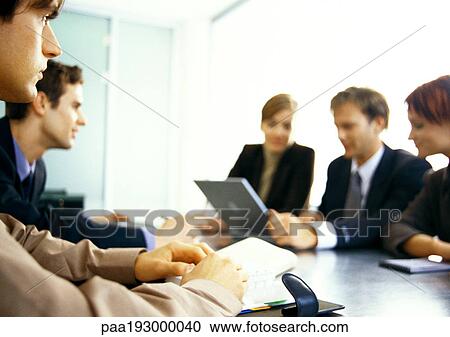 Business people working together at table. View Large Photo Image Stock Image - Business people working together at table.. Fotosearch