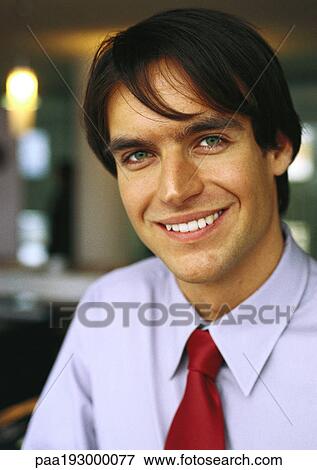 Businessman smiling, portrait, close-up. View Large Photo Image Stock Photo - Businessman smiling, portrait, close-up.. Fotosearch