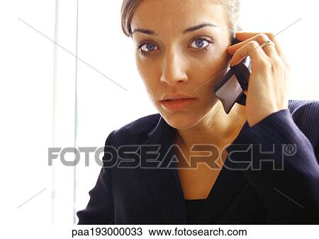 Businesswoman on cell phone, close up. View Large Photo Image Stock Image - Businesswoman on cell phone, close up.. Fotosearch