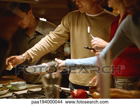 People together in kitchen. View Large Photo Image Picture - People together in kitchen.. Fotosearch