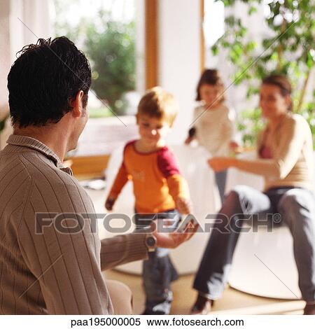 Family playing together. View Large Photo Image Stock Photography - Family playing together.. Fotosearch
