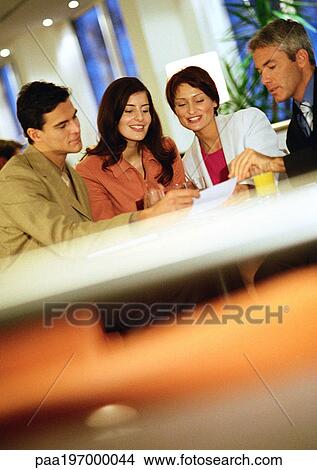 Business people talking together View Large Photo Image Picture - Business people talking together. Fotosearch