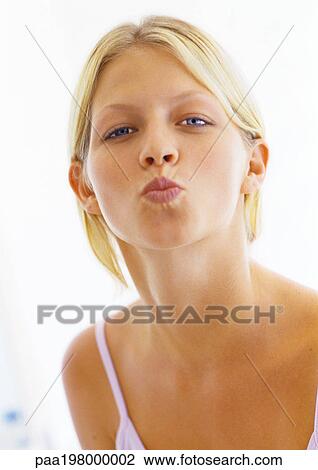 Woman puckering her lips, close up. View Large Photo Image Stock Image - Woman puckering her lips, close up.. Fotosearch