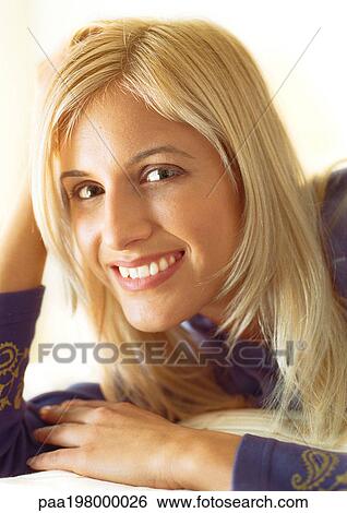 Woman, smiling at camera, portrait View Large Photo Image Stock Photograph - Woman, smiling at camera, portrait. Fotosearch