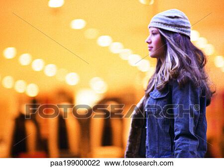 Girl walking by store window. View Large Photo Image Stock Image - Girl walking by store window.. Fotosearch