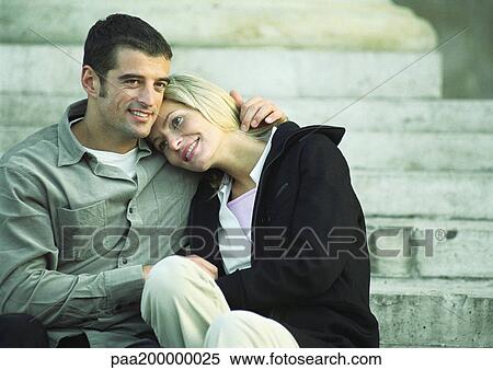 Man and woman sitting on stairs, woman leaning on his shoulder. View Large Photo Image Stock Photography - Man and woman sitting on stairs, woman leaning on his shoulder.. Fotosearch