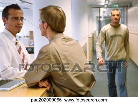 Business people talking in office. View Large Photo Image Stock Photograph - Business people talking in office.. Fotosearch