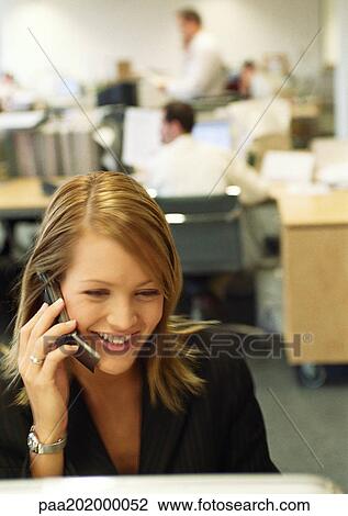 Businesswoman talking on cell phone. View Large Photo Image Stock Image - Businesswoman talking on cell phone.. Fotosearch