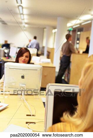 People working in office View Large Photo Image Picture - People working in office. Fotosearch