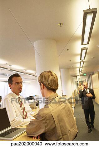 Stock Image - People working in office. Fotosearch