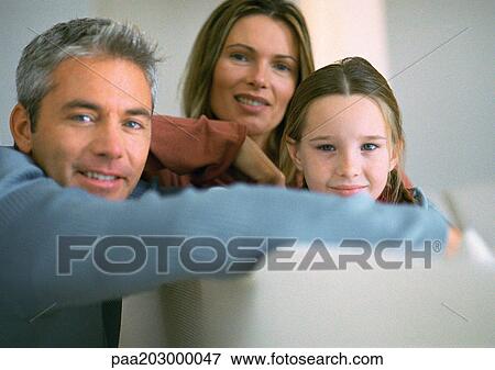 Family sitting together, portrait. View Large Photo Image Stock Photo - Family sitting together, portrait.. Fotosearch
