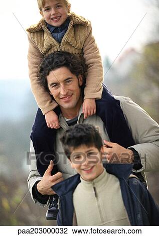 Father with daughter and son in warm clothes. View Large Photo Image Stock Image - Father with daughter and son in warm clothes.. Fotosearch