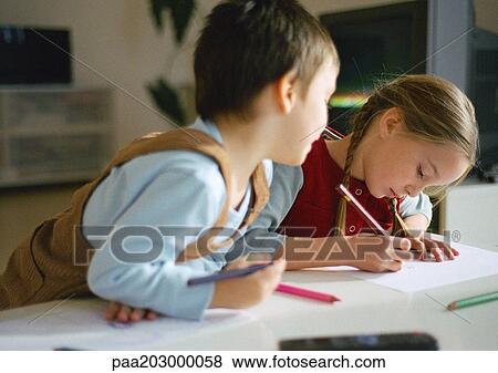 Young boy and girl drawing together, close up. View Large Photo Image Stock Photo - Young boy and girl drawing together, close up.. Fotosearch