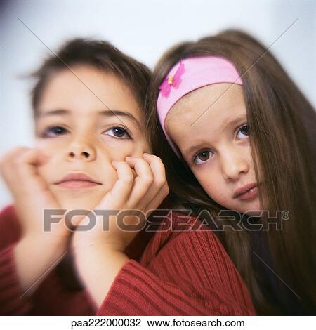 Stock Image - Boy and girl, portrait. Fotosearch