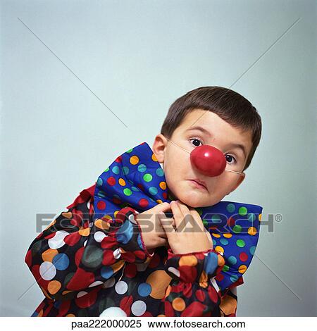 Stock Photography - Boy dressed up as clown. Fotosearch