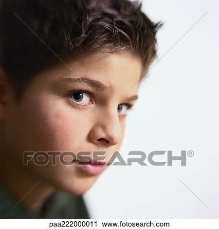 Boy looking at camera, close-up View Large Photo Image Stock Image - Boy looking at camera, close-up. Fotosearch