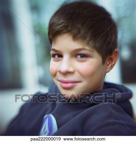 Boy smiling at camera, portrait View Large Photo Image Stock Photo - Boy smiling at camera, portrait. Fotosearch