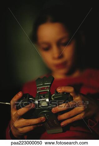Child playing video game, blurred, close up. View Large Photo Image Stock Image - Child playing video game, blurred, close up.. Fotosearch