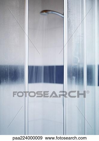 Open shower doors, water running, blurred. View Large Photo Image Stock Photo - Open shower doors, water running, blurred.. Fotosearch