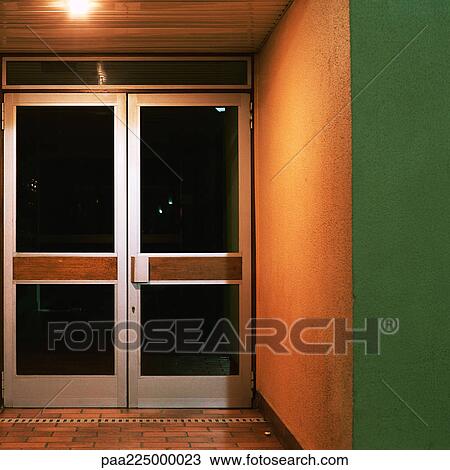 Closed doors at night. View Large Photo Image Stock Image - Closed doors at night.. Fotosearch