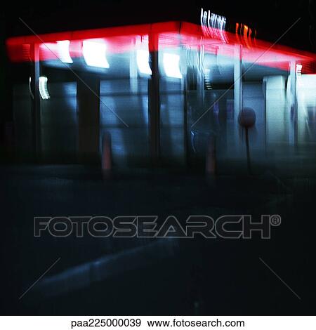 Deserted service station at night, long exposure. View Large Photo Image Stock Photo - Deserted service station at night, long exposure.. Fotosearch