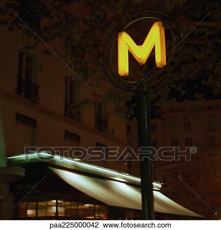 France, Paris, metro sign at night, low angle. View Large Photo Image Stock Image - France, Paris, metro sign at night, low angle.. Fotosearch