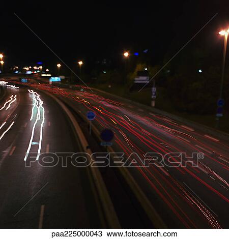 Freeway at night with light trails, elevated view, long exposure. View Large Photo Image Stock Image - Freeway at night with light trails, elevated view, long exposure.. Fotosearch
