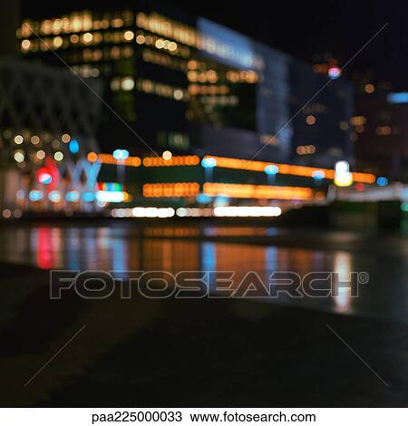 Office buildings lit up at night, exterior, long exposure. View Large Photo Image Stock Image - Office buildings lit up at night, exterior, long exposure.. Fotosearch