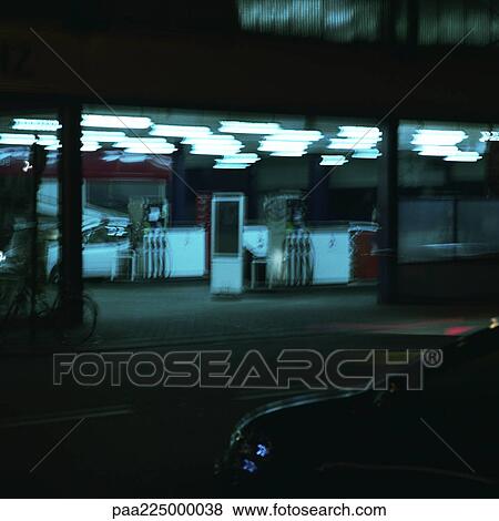 Service station at night, long exposure. View Large Photo Image Stock Photo - Service station at night, long exposure.. Fotosearch
