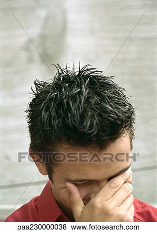 Man covering face with hand, portrait. View Large Photo Image Stock Photo - Man covering face with hand, portrait.. Fotosearch
