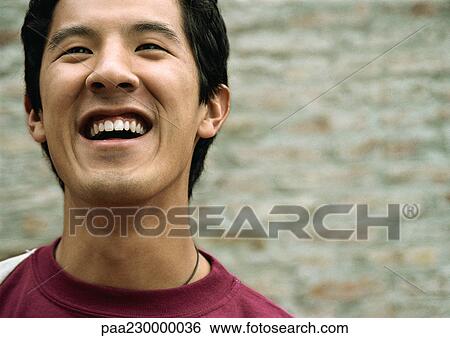 Man smiling at camera, portrait. View Large Photo Image Stock Photograph - Man smiling at camera, portrait.. Fotosearch