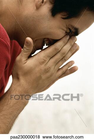 Man smiling, holding hands to face, side view portrait. View Large Photo Image Stock Photo - Man smiling, holding hands to face, side view portrait.. Fotosearch